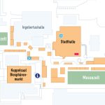 Veranstaltungsplan mit den Gebäuden Stadthalle, Kuppelsaal, Biosphärenmarkt, Ingobertushalle und Messezelt, mit Symbolen für Informationsstellen und Toiletten sowie den Wegen, die die Bereiche miteinander verbinden.